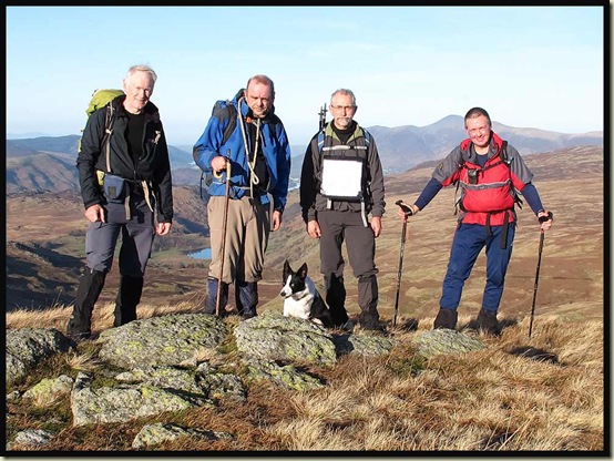 Team photo at lunchtime on Low Saddle of Coldbarrow Fell (656 metres)