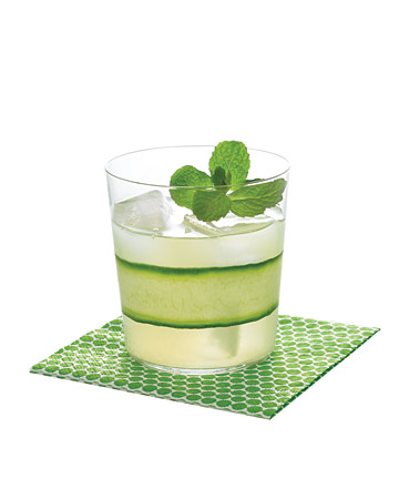 I like the idea of decorating your cocktails. Here, a gimlet is dressed up with the thinnest strip of cucumber.