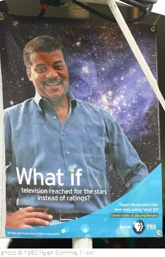 'Neil deGrasse Tyson Reading Poster' photo (c) 1980, Ryan Somma - license: http://creativecommons.org/licenses/by/2.0/