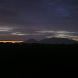 The vast Liman range as seen from the train between Madiun and Nganjuk before dawn - Limas is the peak on the left (Daniel Quinn, December 2010)