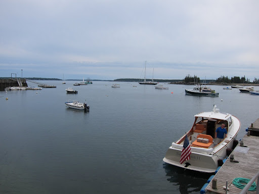 Yes, that's right!  We're headed out to sea.  There's Shipmate Bryan waiting at the dock with Martha's Hinckley picnic boat!