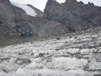 In sight of Muir. Guide shack to left, outhouses to right. Public hut out of view to right.