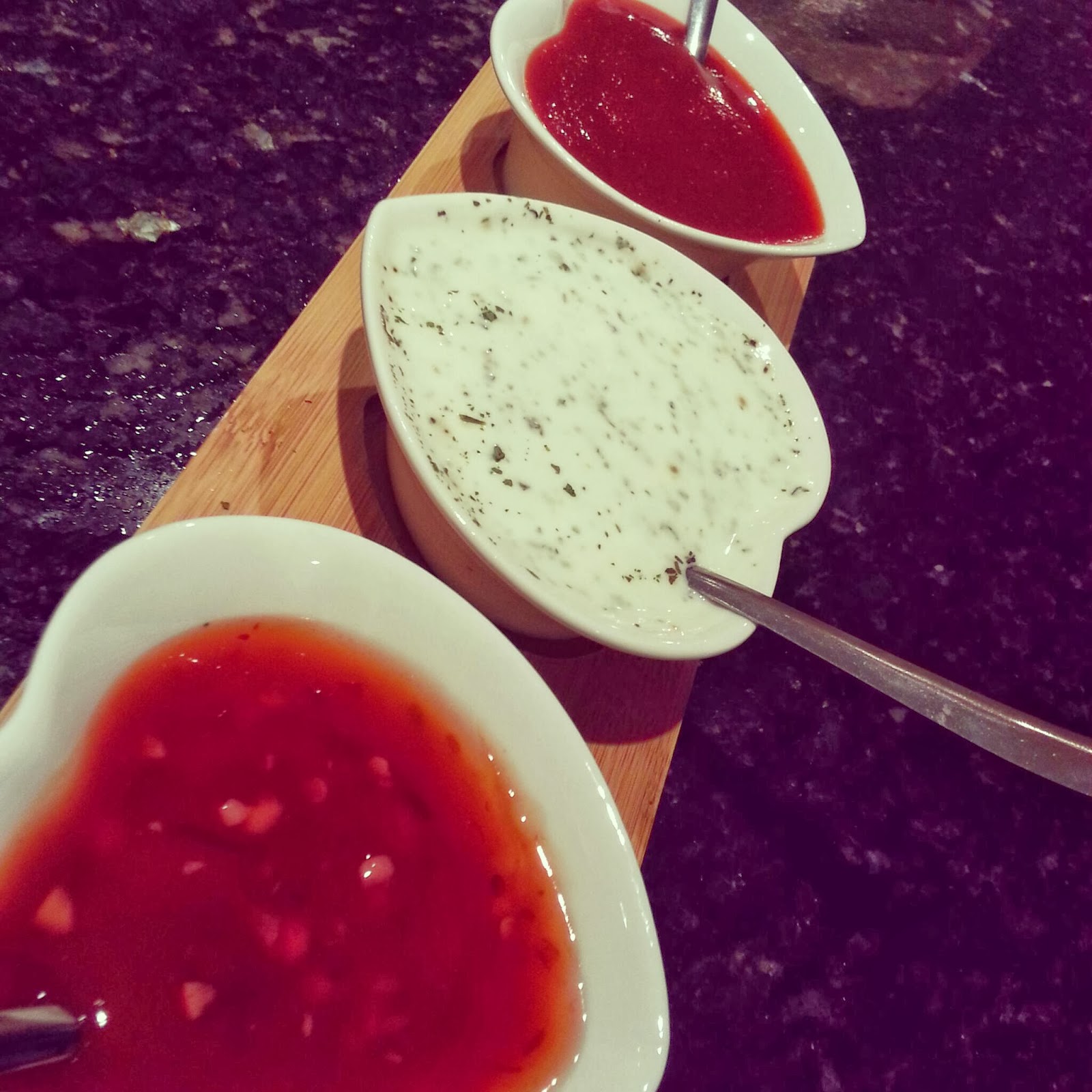 Trio of home made sauces sweet chilli, mint and herbs yoghurt and uber
