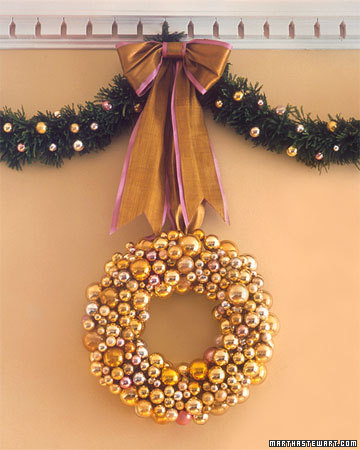 This wreath can be made with any color of glass ornaments, but the unexpected color combination of pink and gold makes this really special.