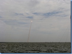 7978 private boat charter with Capt. Ron Presley  and his wife Karen - Banana River, Florida - Kennedy Space Center - Atlantis blasts off marking final NASA shuttle launch