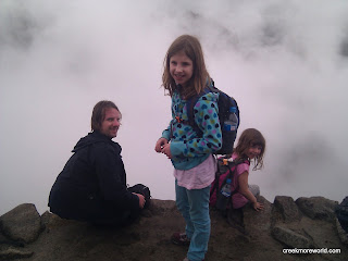 Waiting at the edge for clouds to pass and show us Machu Picchu.