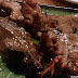 A (slightly blurred) closeup of Spare Ribs at Gardena Fresca Garden Pond & Grill A (slightly blurred) closeup of Spare Ribs at Gardena Fresca Garden Pond & Grill