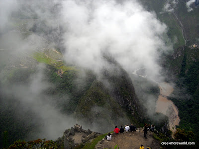 The clouds never totally clear while we are at the top, but it was still stunningly beautiful.