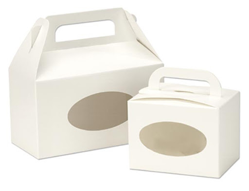 Here are some handy boxes from The Container Store -- the see-through window is just like a professional bakery box.