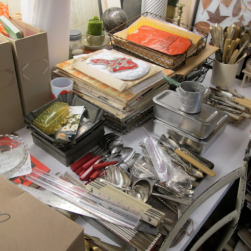Fritz organizes his collections by the type of object–vintage spoons, rulers, and food storage containers all have their place.