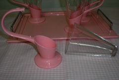 Soda fountain/parfait set with four pink plastic and glass cups and a pink tray 