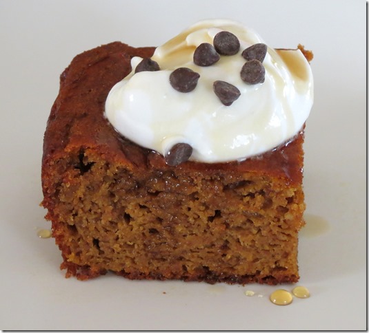 Grain Free Pumpkin Gingerbread Cake with whipped coconut cream and maple syrup