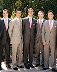 In a twist on the trend of having bridesmaids wear variations on a theme, this groom told his groomsmen to wear their own gray suits -- most of them own a few for work -- with matching pink ties. In a twist on the trend of having bridesmaids wear variations on a theme, this groom told his groomsmen to wear their own gray suits -- most of them own a few for work -- with matching pink ties.