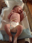 I think this may be the first photo of Audrey...at least it's up there. This is within a couple minutes of her being born.