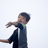 Kai throwing a sand ball