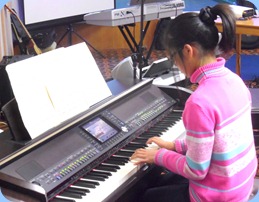 Tina Yang played two songs for us on our Clavinova. Well done Tina very nicely done.