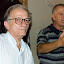 Foto tirada no dia 11 de novembro de 2005, por ocasião do lançamento dos livros [autores: Benedicto de Abreu Sá, Bassalo, Bassalo e Mauro Sérgio Dorsa Cattani, José Jerônimo de Alencar Alves e Bassalo (CD)], no Colégio Estadual Paes de Carvalho. Da esquerda para a direita: Antônio Gomes de Oliveira, Diretor de Ciência e Tecnologia da SECTAM, Bassalo, Mauro Sérgio Dorsa Cattani, Professor Titular da USP, e Raymundo José Ribeiro Serra, professor aposentado da UFPA.