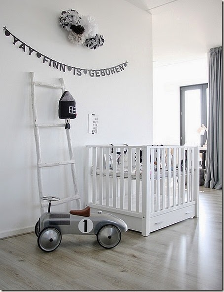 white-nursery-room-in-Scandinavian-style-contains-white-crib-and-white-ladder