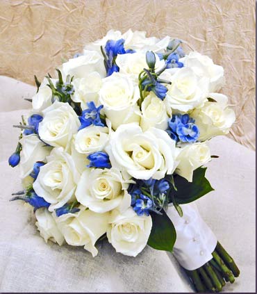 Flower Arrangements Centerpieces on White Roses And Light Blue Delphinium