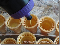 filling cones with batter filling cones with batter