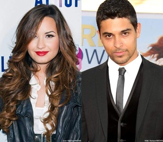 demi-lovato-and-wilmer-valderrama-stealing-kisses-at-party