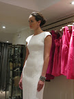 Try wearing a little white dress for your rehearsal dinner. Later on, you could wear it to work with a blazer and cardigan.