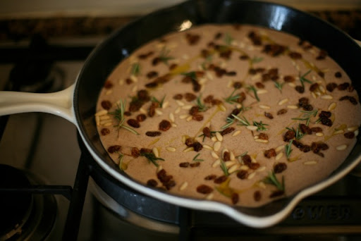 Castagnaccio forming in the skillet