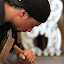 Te Puia Carving Student at Work - Rotorua, New Zealand