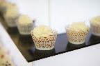 All white iced cupcakes for the party.