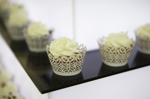 All white iced cupcakes for the party.