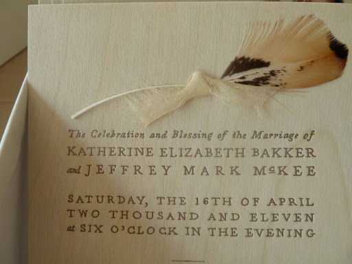 Each program was letterpressed sheets of wood veneer and had a quail feather tied on the top.