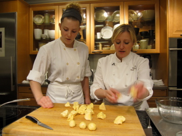 Rolling out each little monkey bread ball. Rolling out each little monkey bread ball.