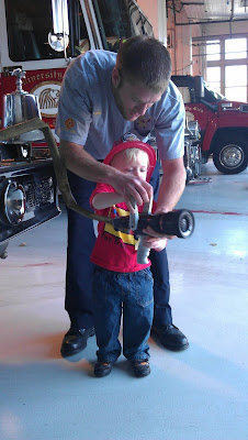 Andy holds the nozzle