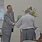 Rev Shumake wins door prize