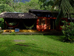 Picture of Barra do Una. Photo number 3799305524 by Pousada Pé na Areia - Charming, fully decorated sea facing chalets located on Boiçucanga beach, on São Paulo northern shore. Boiçucanga is a beach with calm waters and woundrous sunset, surrounded by the Atlantic Rainforest and by very good restaurants. There also is a complete services infrastructure that includes supermarkets and shopping malls. You can find all that and much more at “Pé na Areia” (aka “Esquina da Mentira”), the perfect place for spending your vacations and weekends, or even having your own house at the sea.