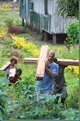 Aaron carrying wood