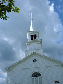 The spire is safely back on the church.