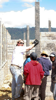 Jason helping steady a column. Jason is a big guy in the states, but here....One of the villagers called 5'3" Ira 'muy alto' (very tall). Photos by TOM HART
