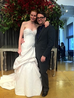 Judd poses with a model showcasing one of his beautiful gowns. Judd poses with a model showcasing one of his beautiful gowns.