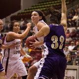 Carly Selvig, standout sophomore forward for the Lady Griz, turns the corner on Carroll's Jordan Johnston late in Tuesday's season opener. Montana came out on top 72-45, helped along by Selvig's team-high four blocks.
Dahlberg Arena in Missoula, Mont., October 30th, 2012.