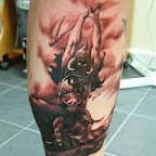 executioner with ax - Leg Tattoos Designs