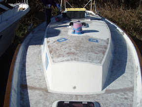 Sanding of the deck in process. You can see lots of the non-skid sanded down, but a patch is still left.