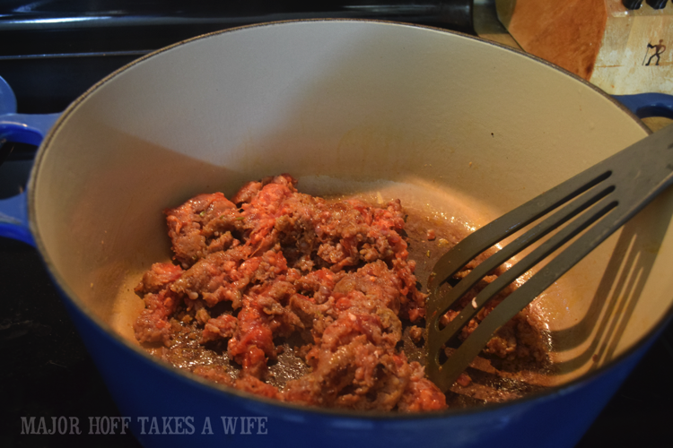 Saute sausage in Le Creuset. Saute sausage in Le Creuset