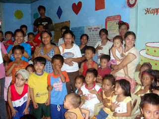 Buntong Palay Day Care Center pupils together with their parents and siblings