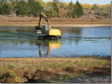 Backhoe in lake