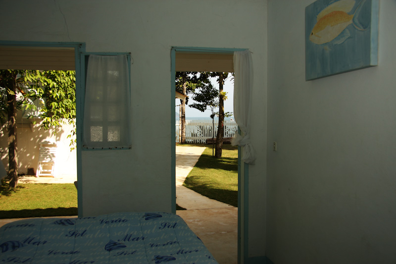 Pictures of Chalé 5: Panaguaiú. Picture number 4003452019. Photo by Pousada Pé na Areia - Charming, fully decorated sea facing chalets located on Boiçucanga beach, on São Paulo northern shore. Boiçucanga is a beach with calm waters and woundrous sunset, surrounded by the Atlantic Rainforest and by very good restaurants. There also is a complete services infrastructure that includes supermarkets and shopping malls. You can find all that and much more at “Pé na Areia” (aka “Esquina da Mentira”), the perfect place for spending your vacations and weekends, or even having your own house at the sea.
