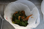 Oh, excellent!  It holds all of the fruit and vegetable scraps.  Before, we just had pails with no covers.  These are much nicer.