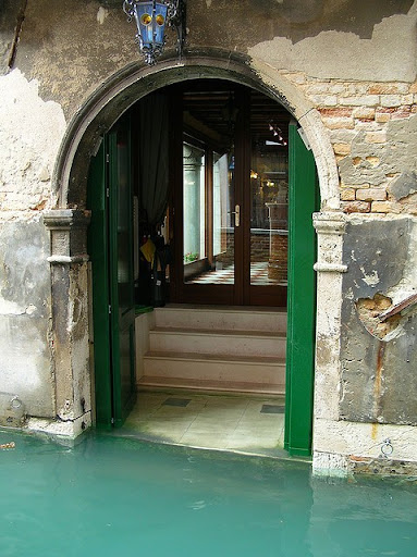 Look at how the water meets up against the buildings. This is really an awesome image of a typical view in Venice. 
(pininterest.com)