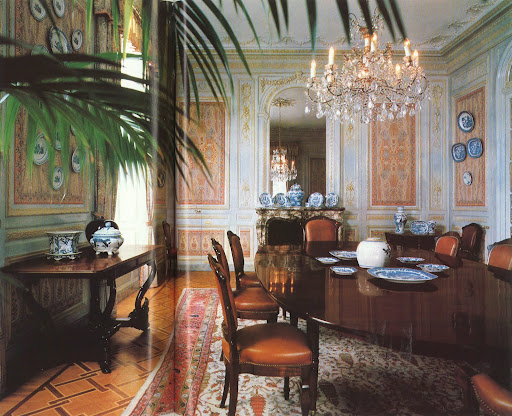 The dining room at the villa at Cap Ferrat combines quite a few of my loves: antique blue and white porcelain objets, a 19th-century Persian rug, and an antique crystal chandelier. The dining room at the villa at Cap Ferrat combines quite a few of my loves: antique blue and white porcelain objets, a 19th-century Persian rug, and an antique crystal chandelier.