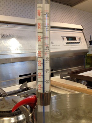 candy thermometer in boiling water
